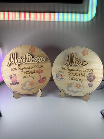 Personalised Baby Birth Announcement Plaques with 3D engraved names, birth details, sweet illustrations, and display stands on eco-friendly basswood