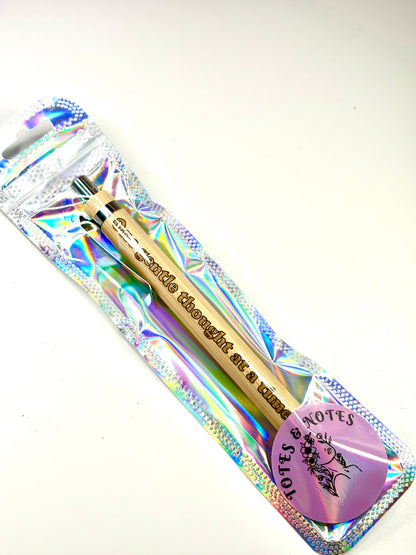 Eco-friendly engraved bamboo pen with "one gentle thought at a time" inscription, refillable with blue or black ink.