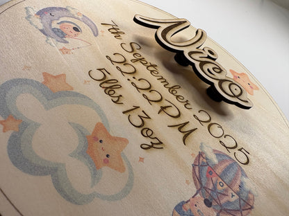 Personalised baby birth announcement plaque in basswood with 3D name, birth details, cute star and cloud illustrations