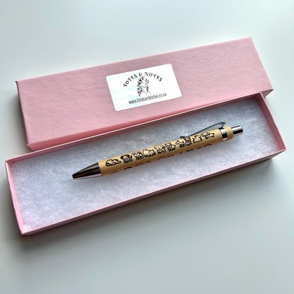 Kawaii Dog Bamboo Pen in pink gift box, featuring engraved cute dog designs, eco-friendly stationery gift.