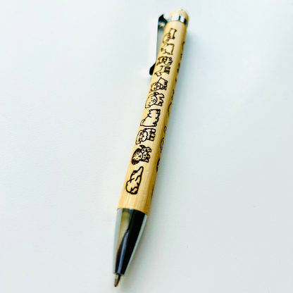 Kawaii Dog Bamboo Pen with engraved dog designs, eco-friendly stationery gift in bamboo.
