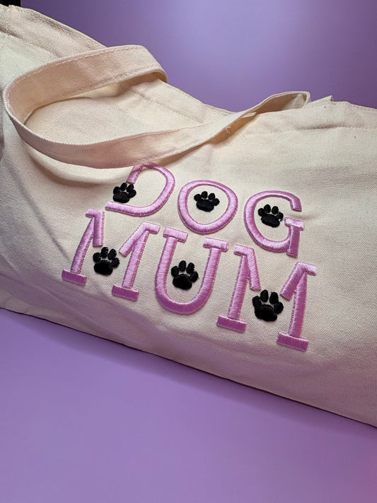 Dog Mum 3D puff embroidered heavy canvas tote bag with paw prints on pastel purple background