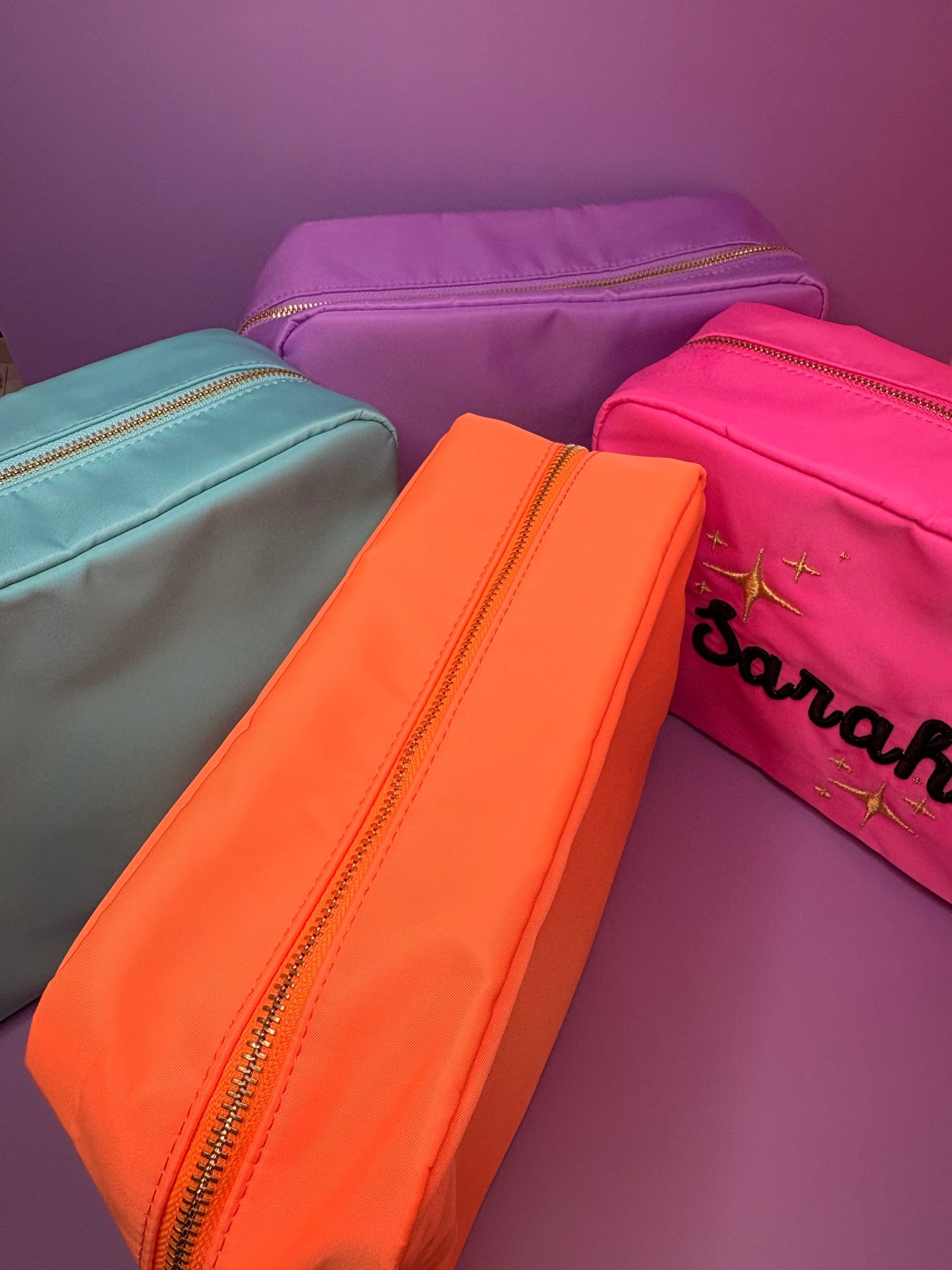 Personalised 3D puff embroidered large cosmetic bags in vibrant colors with spacious zippered design