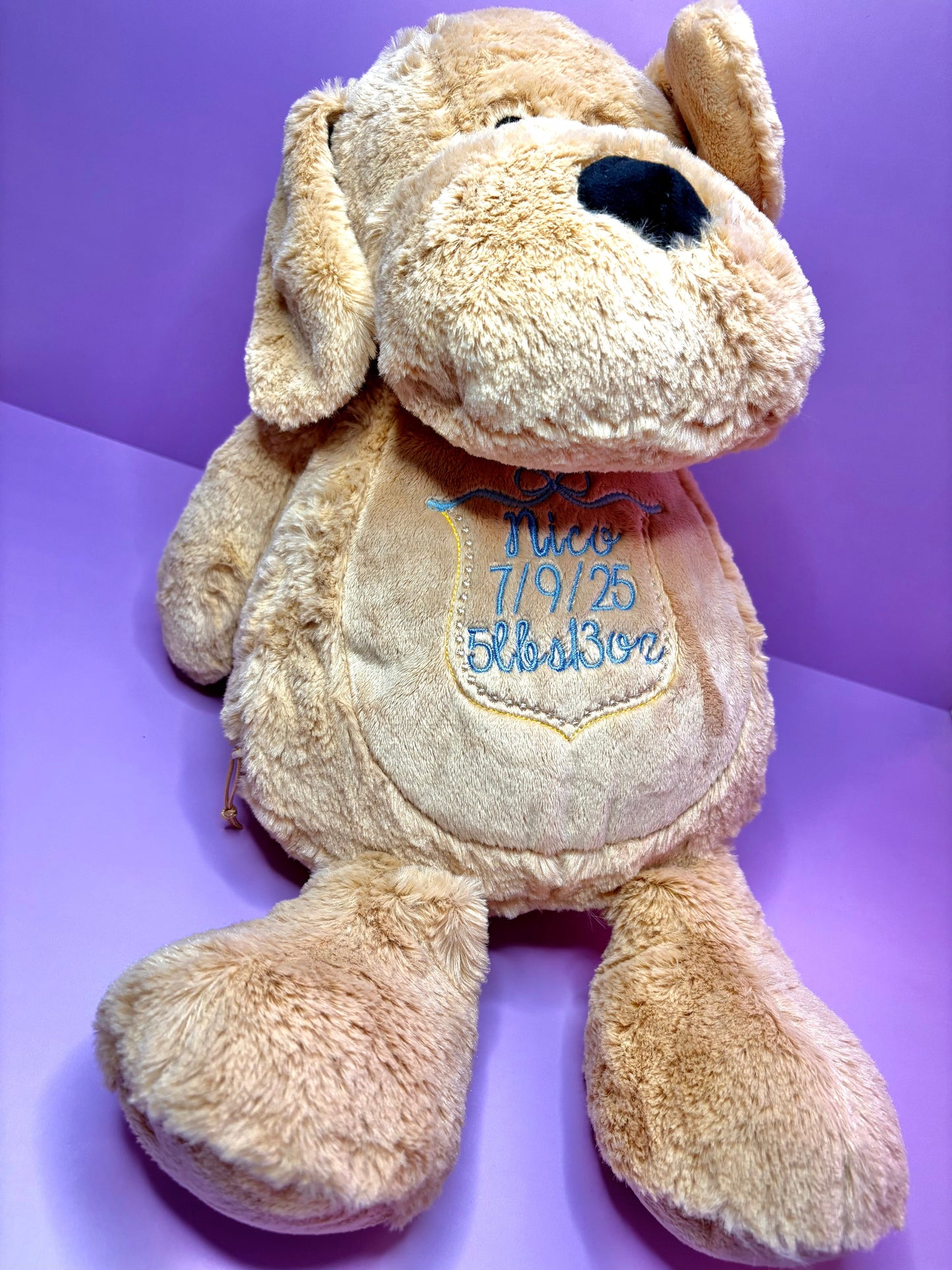 Personalised birth announcement soft toy dog with embroidered baby details, soft and cuddly newborn keepsake