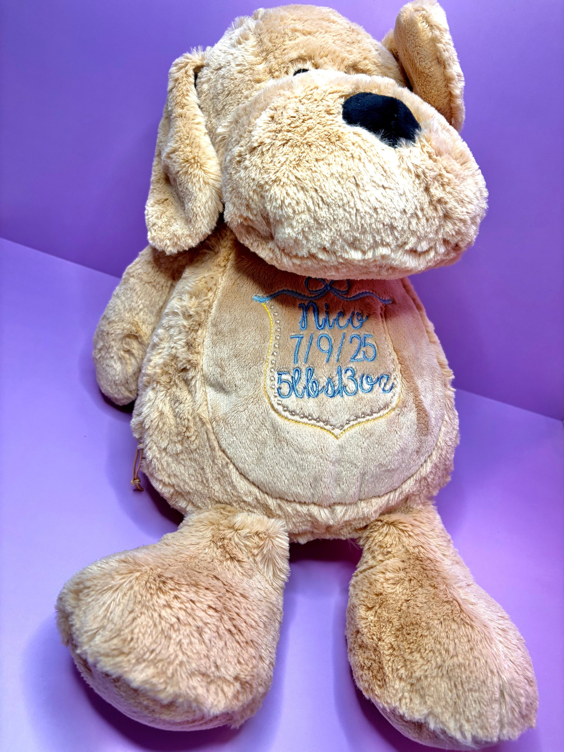 Personalised birth announcement soft toy dog with embroidered baby details, soft and cuddly newborn keepsake