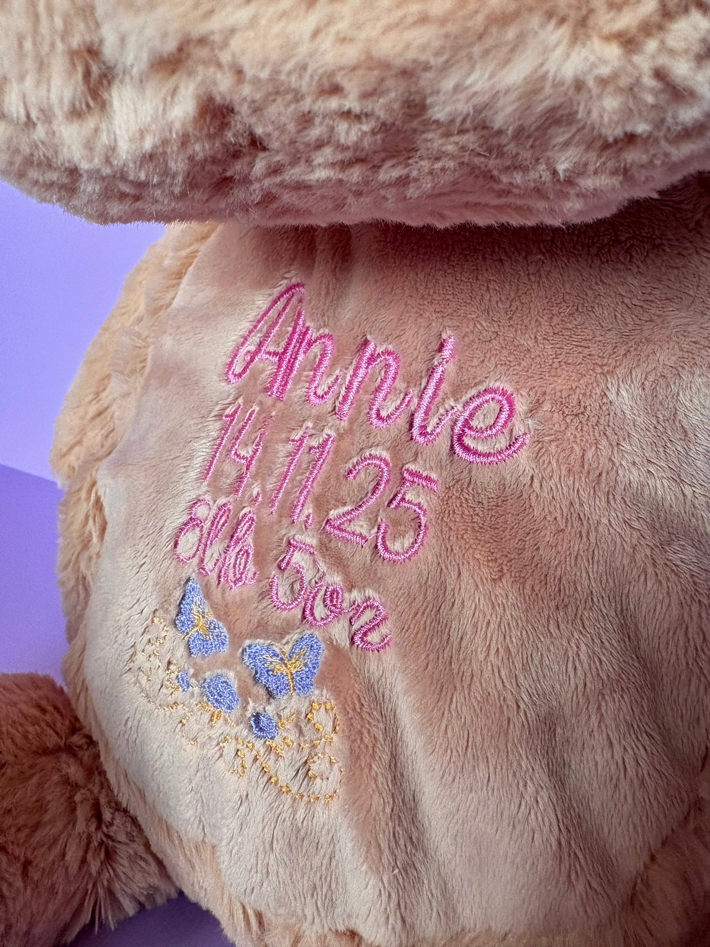 Personalised birth announcement embroidered soft toy dog with baby name and birth details