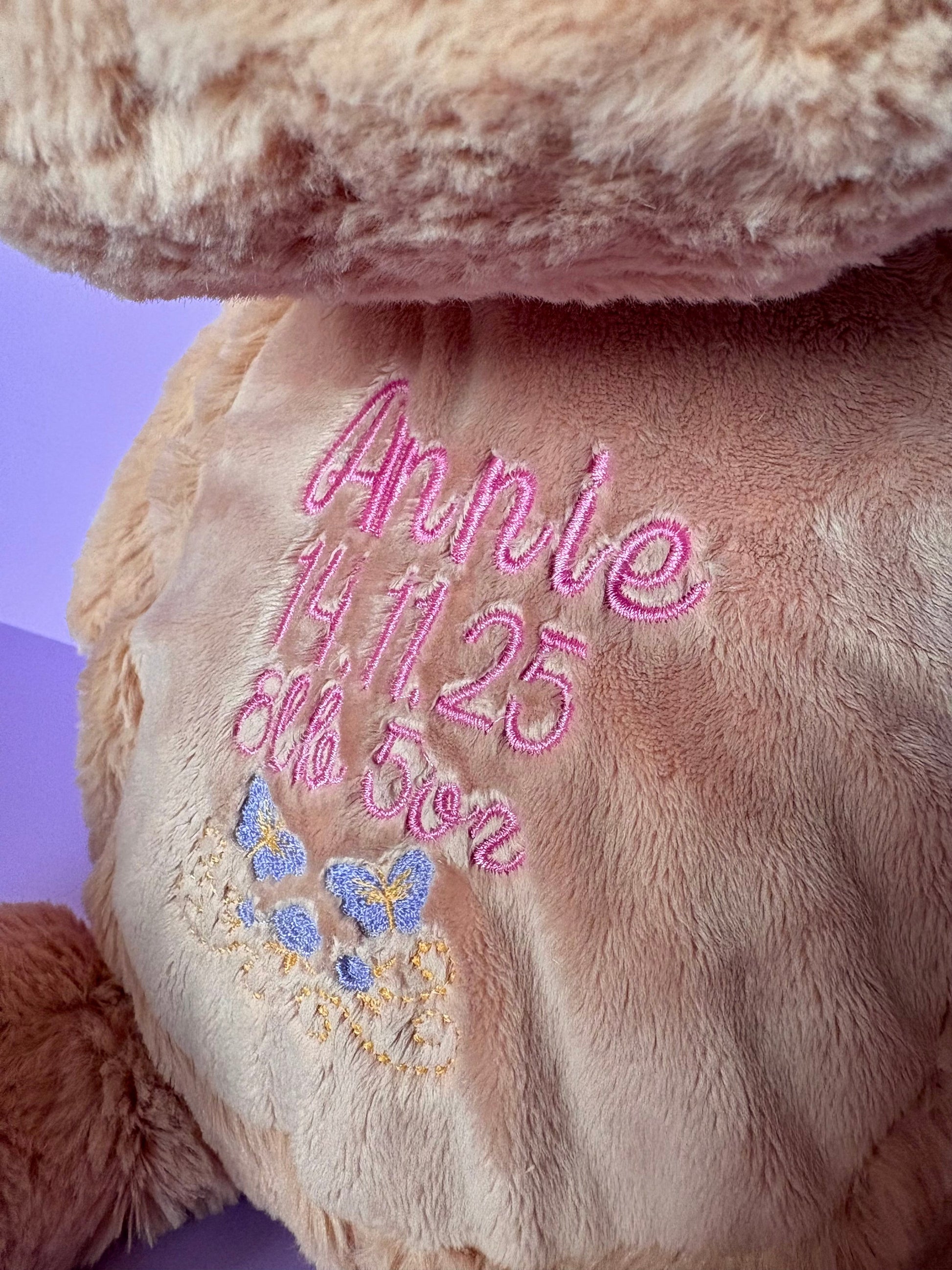 Personalised birth announcement embroidered soft toy dog with baby name and birth details