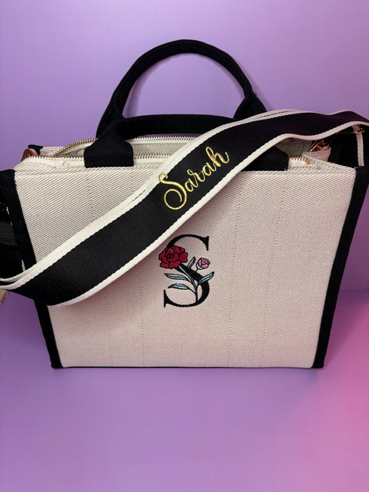 Personalised embroidered tote bag with monogram and name strap made from heavy twill fabric with zip pocket