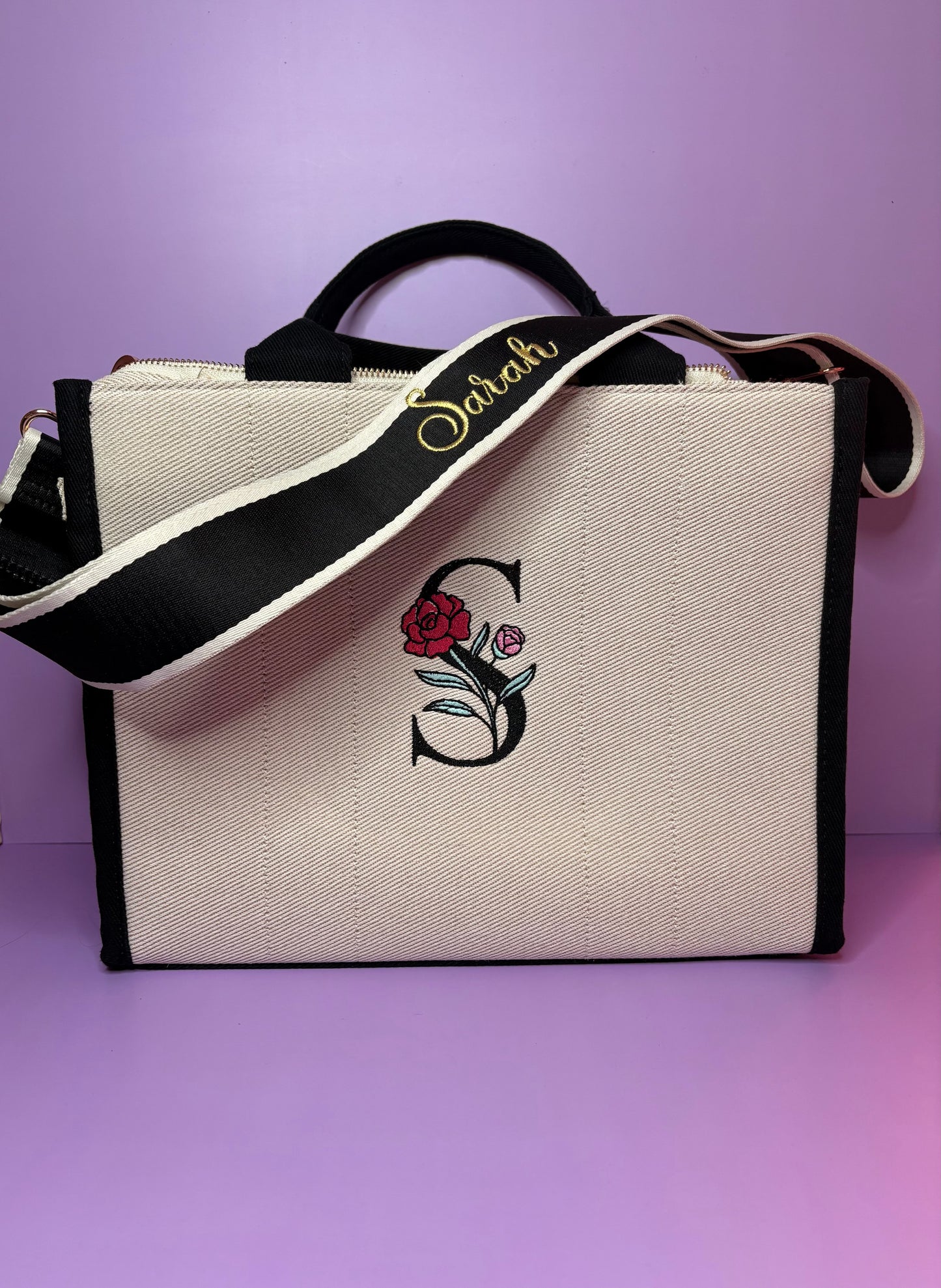 Personalised embroidered tote bag with monogram and name strap made from durable heavy twill fabric with internal zip pocket