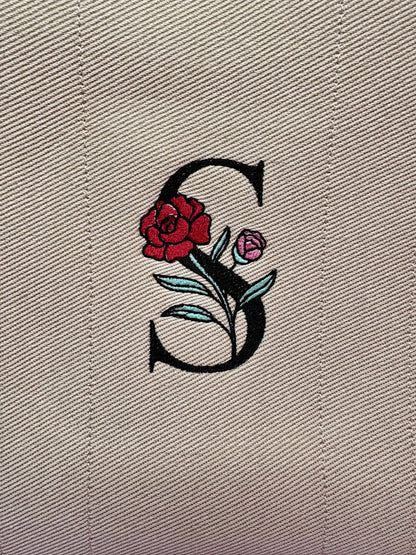 Personalised embroidered tote bag with monogram and name strap made from heavy twill fabric with internal zip pocket