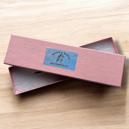 Eco-friendly Kawaii Dog Bamboo Pen with cute engraved dog design and ink options; perfect sustainable gift.