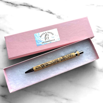 Eco-friendly Kawaii Dog Bamboo Pen with engraved cute dog designs in a pink gift box, available in blue or black ink.