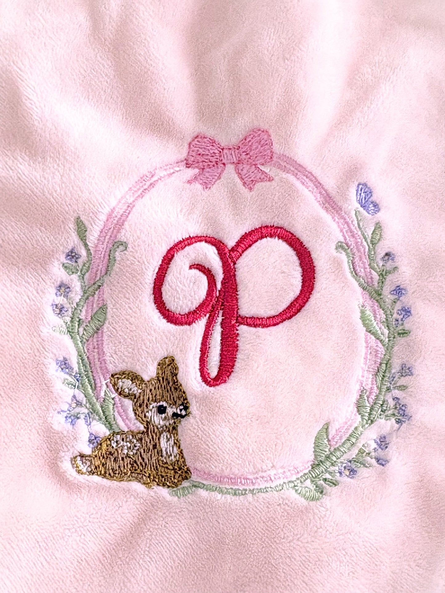 Personalised baby bundle gift set with nursery storage trug, soft minky blanket, and rattling comforter for baby shower gift