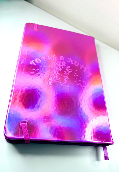 A5 Tiny Spells Notebook with holographic pink PU leather cover and embossed design