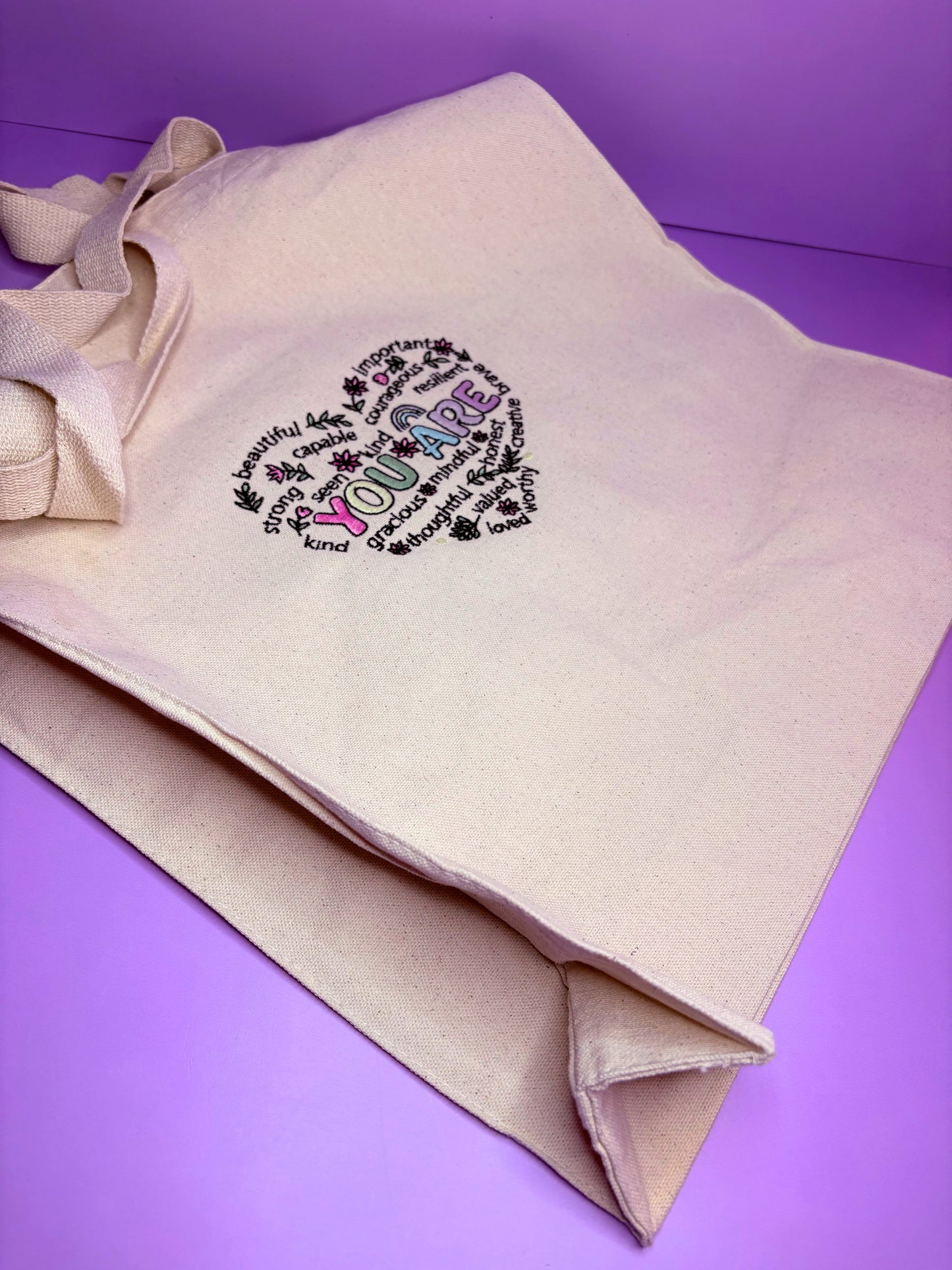 Uplifting Reminder Embroidered Canvas Tote Bag with long handles and gusseted base, durable heavy canvas shopping bag with positive affirmations, ideal birthday gift