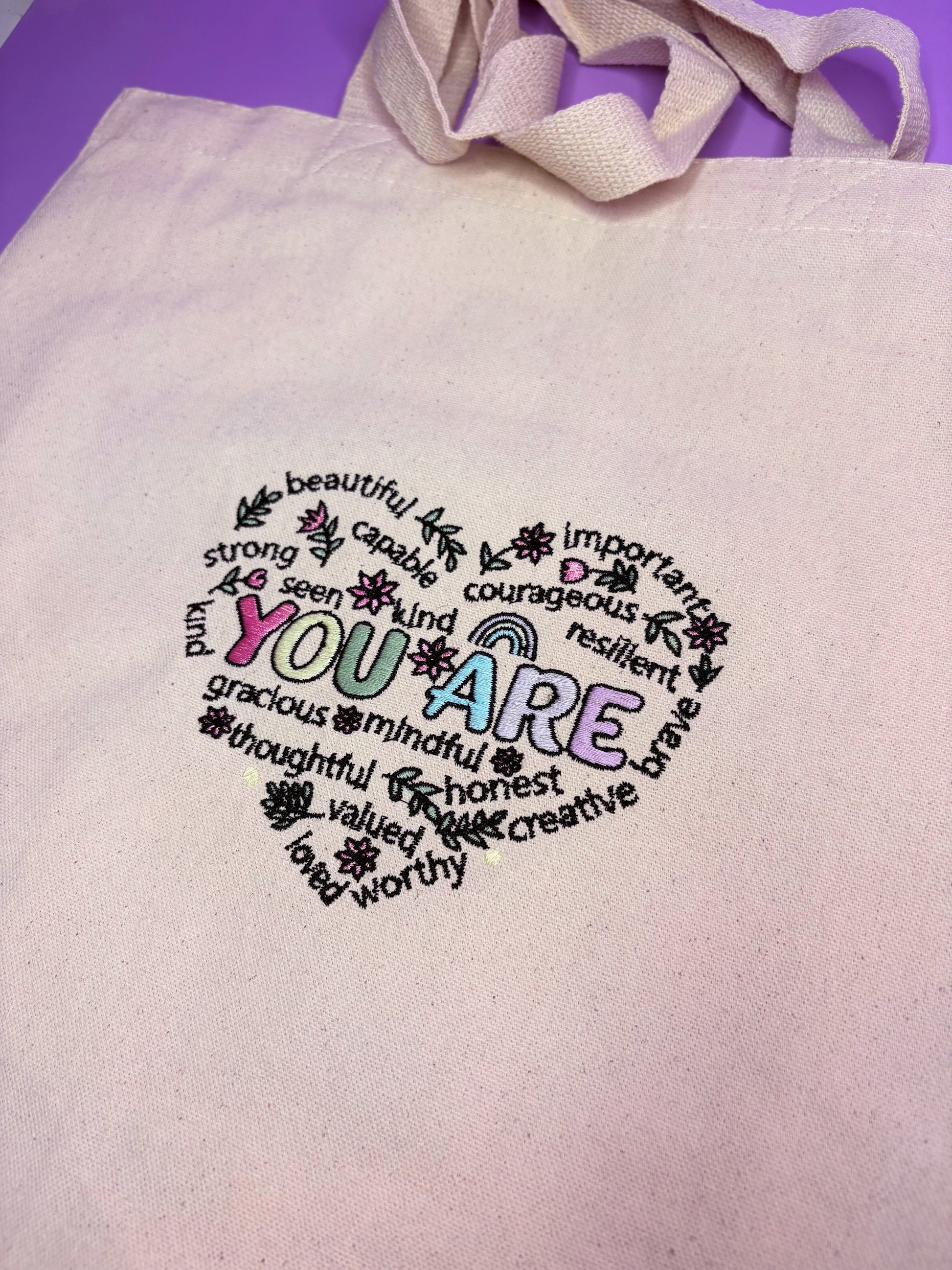 Uplifting Reminder Embroidered Canvas Tote Bag with durable gusseted base and long handles for everyday use and thoughtful gifting