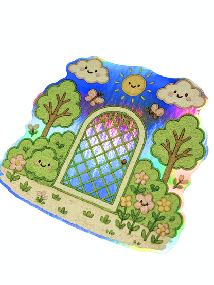 Holographic sticker with kawaii garden gate, smiling sun, clouds, trees, flowers, and butterflies design.