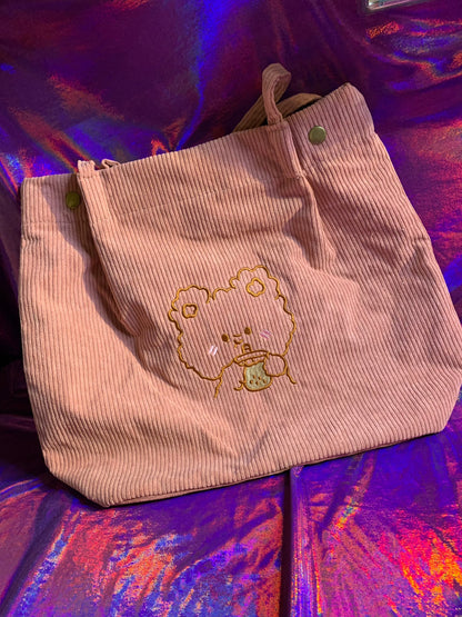 Kawaii pink and white tote bag with cute embroidered bear holding boba, waterproof material.